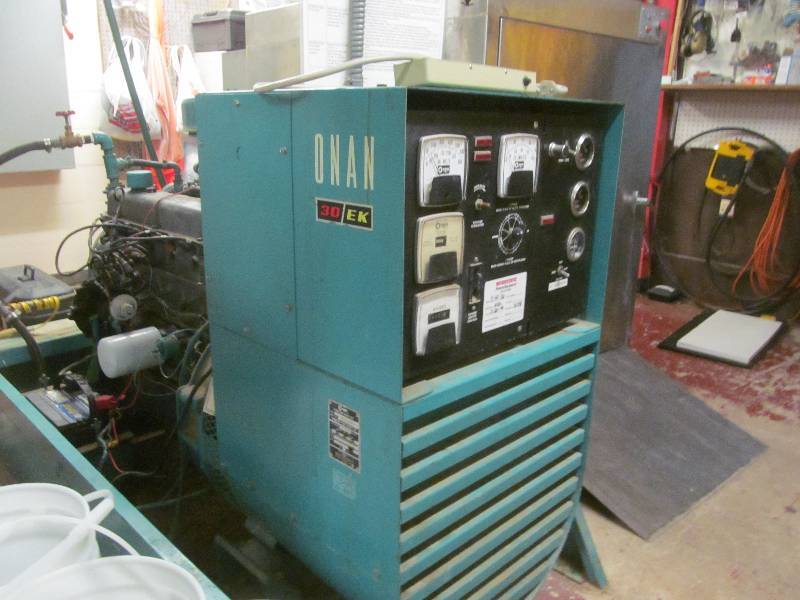 lot 457 image: Cleaning room-Onan 30 EK generator