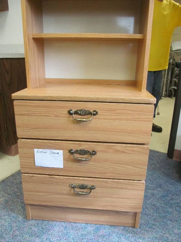 lot 517 image: B2- Bedside Table has broken drawer, 3 drawer 2 shelves (50x25x18)