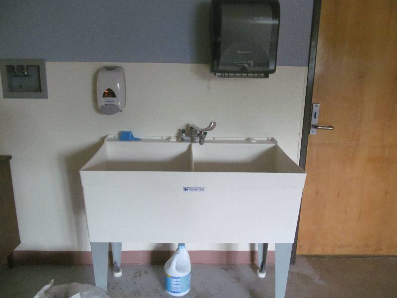 lot 542 image: Basement #2-Sink, towel and soap dispenser-3 drawer cabinet