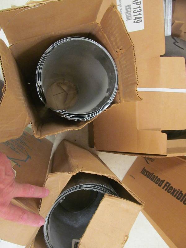 lot 561 image: Basement #2-Duct work- Chimney top, insulating ducting (total 6 boxes)
