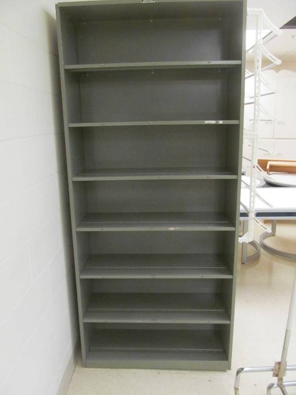 lot 664 image: Metal Shelf-Double sided with attached racks on one end (36x25x81)