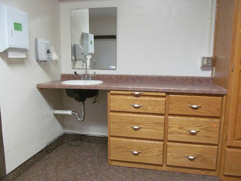 lot 735 image: Rm 5- Vanity-6 Drawer cabinet, towel, soap disp.