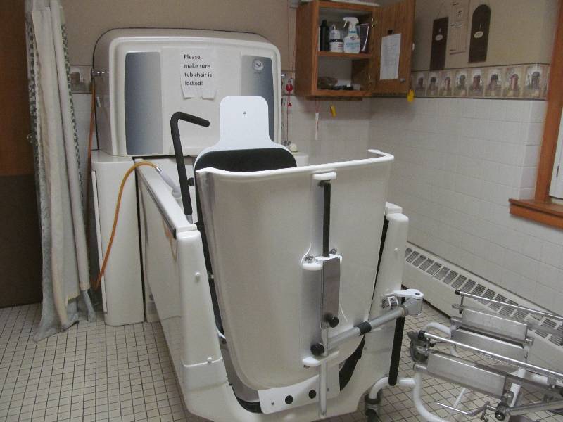 lot 741 image: Tub Room- Tub with sliding chair (Master care)