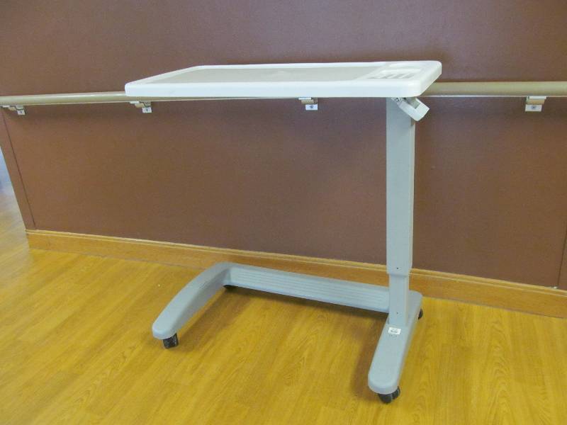 lot 783 image: In dining room 2- Adjustable bed side table