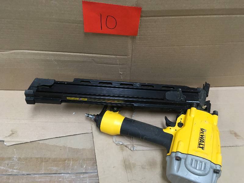 Dewalt Pneumatic 21-Degree Collated Framing Nailer in working condition