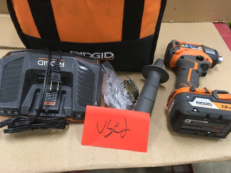Ridged 18-Volt Lithium-Ion 12 in. Cordless Brushless Compact Hammer Drill Kit with (2) 2.0Ah Batteries, Charger and Bag in working conditions