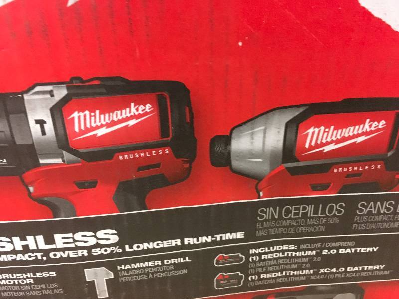 Milwaukee M18 18-Volt Lithium-Ion Brushless Cordless Hammer DrillImpact Combo Kit (2-Tool) W(2) Batteries, Charger, Bag in working conditions