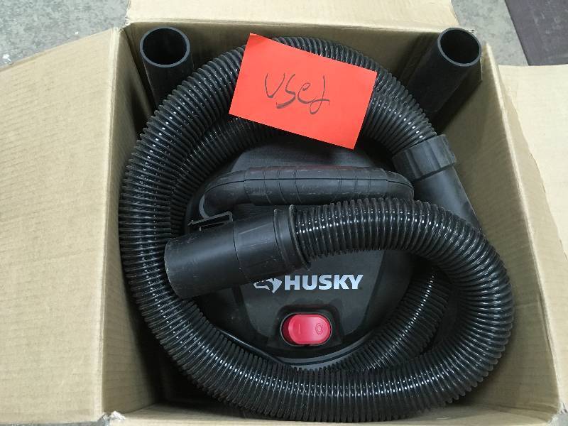 Husky 4 Gal. Portable Poly WetDry Vacuum in working conditions