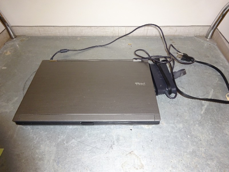 lot 1 image: Dell Latitude Laptop