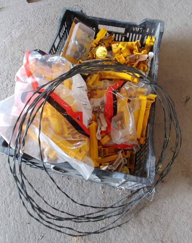 lot 34 image: Tote full of Elec. Fence Insulators.