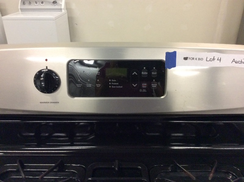 lot 4 image: Kenmore Stainless Steel 4 Burner Gas Stove