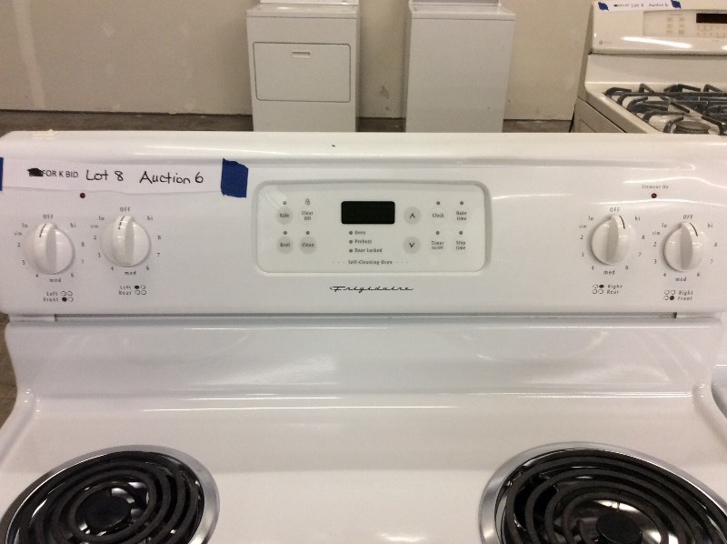 lot 8 image: Frigidaire White Coil Top Electric Stove