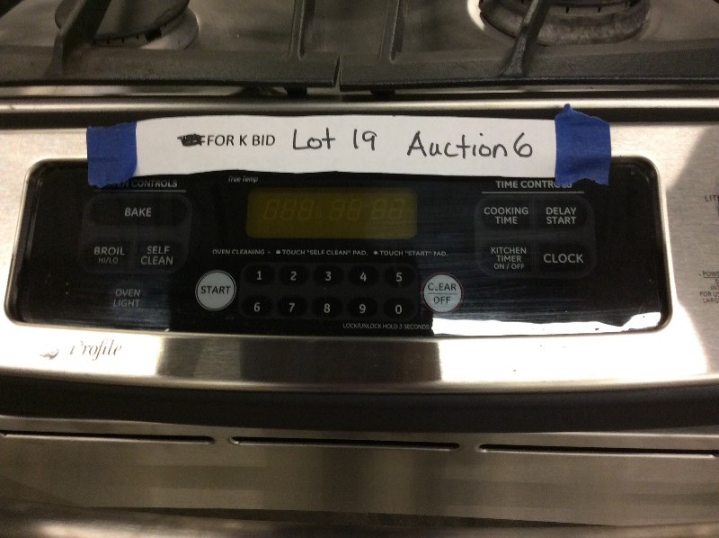 lot 19 image: GE Stainless Steel 4 Burner Slide In Gas Stove