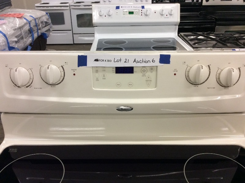 lot 21 image: Whirlpool Bisque Glass Top Electric Stove