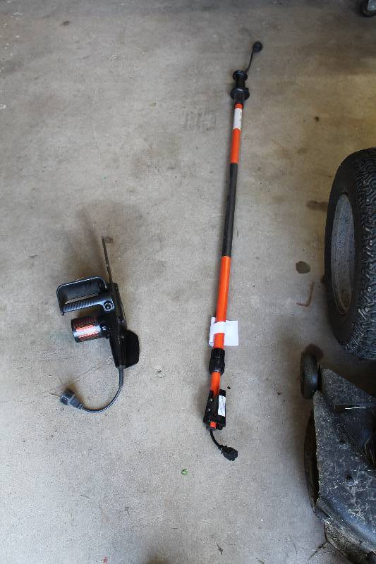 lot 15 image: Remington Electric Pole Saw, Electric Chain Saw