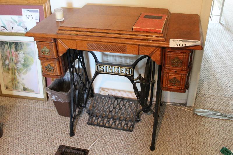 lot 301 image: Singer Sewing Machine Table w Instructions, Sewing Library, Tools