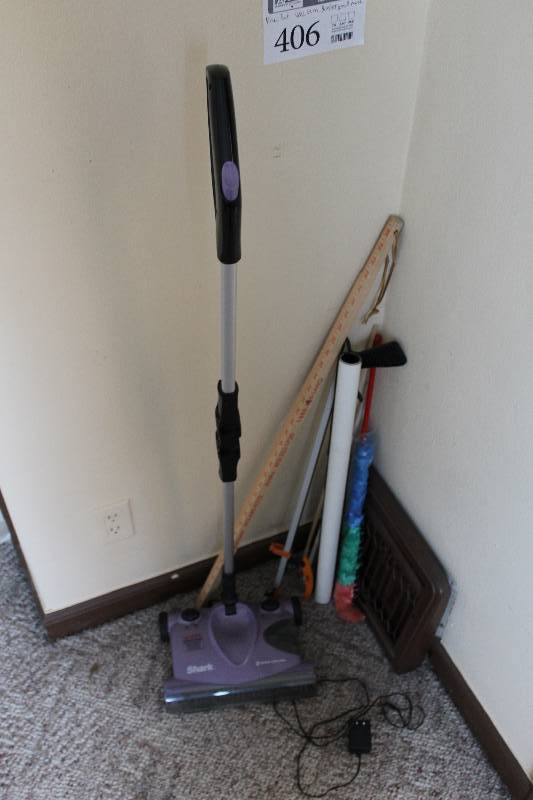lot 406 image: Vacuum, Duster, Yard Stick, Trash Stick, And More
