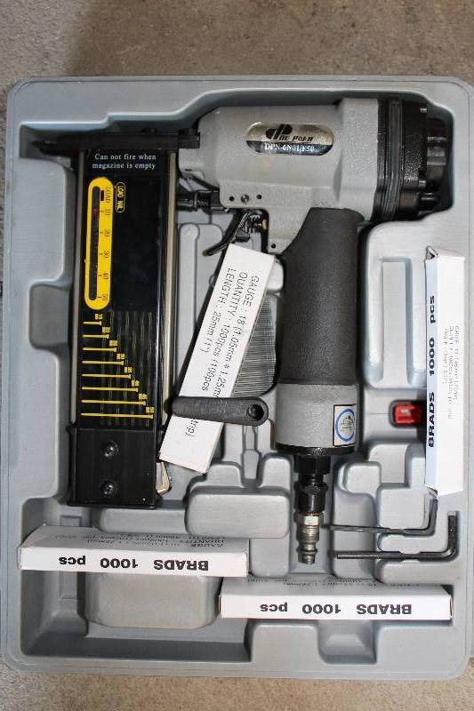 lot 44 image: Poe Poan Pneumatic Stapler w Case, Brads