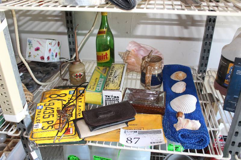 lot 87 image: Collectibles, License Plates, Squirt Glass Bottle, Huffy Oiler Can, Nut Crackers, And More