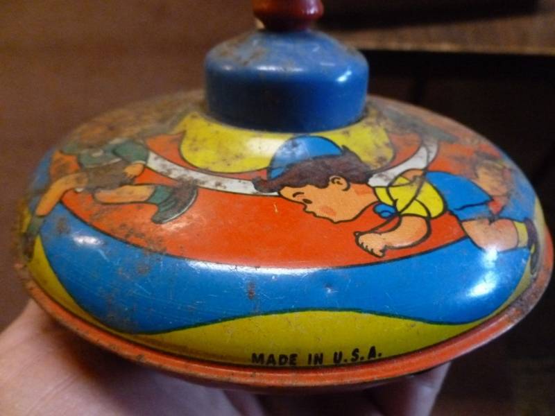 Vintage Metal Top Toy