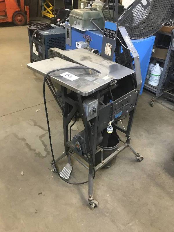 PACKAGE TYING MACHINE