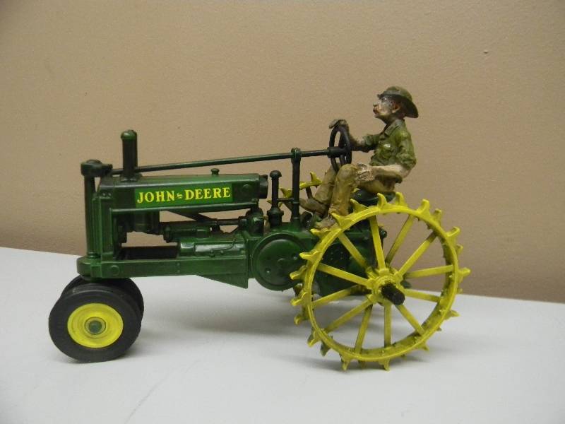 old metal john deere toy tractor