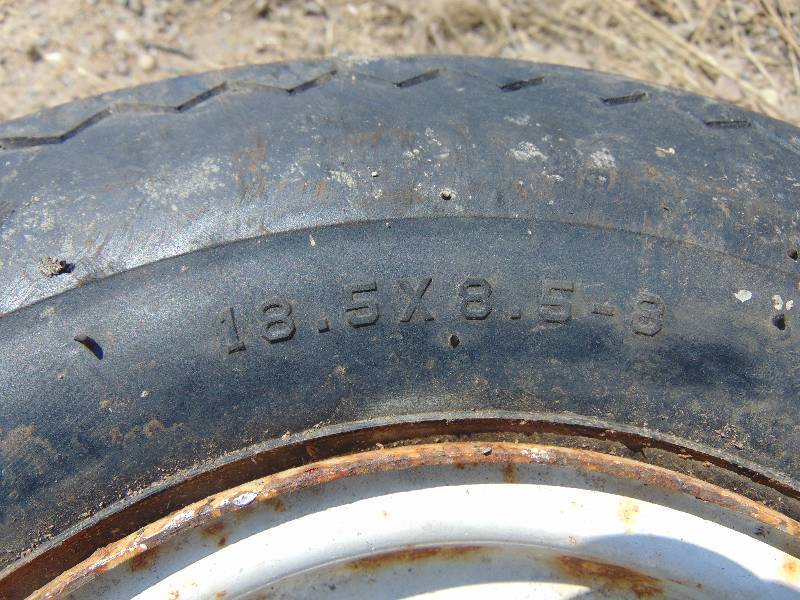 lot 90 image: 18.5 x 8.5 x 8 Trailer Tire With 4 Bolt Rim