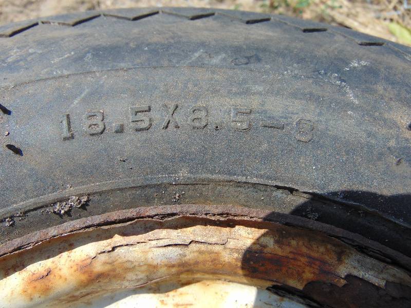 lot 91 image: 18.5 x 8.5 x 8 Trailer Tire With 4 Bolt Rim