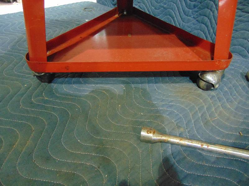 lot 137 image: Small Rolling Seat and 4-Way Bar