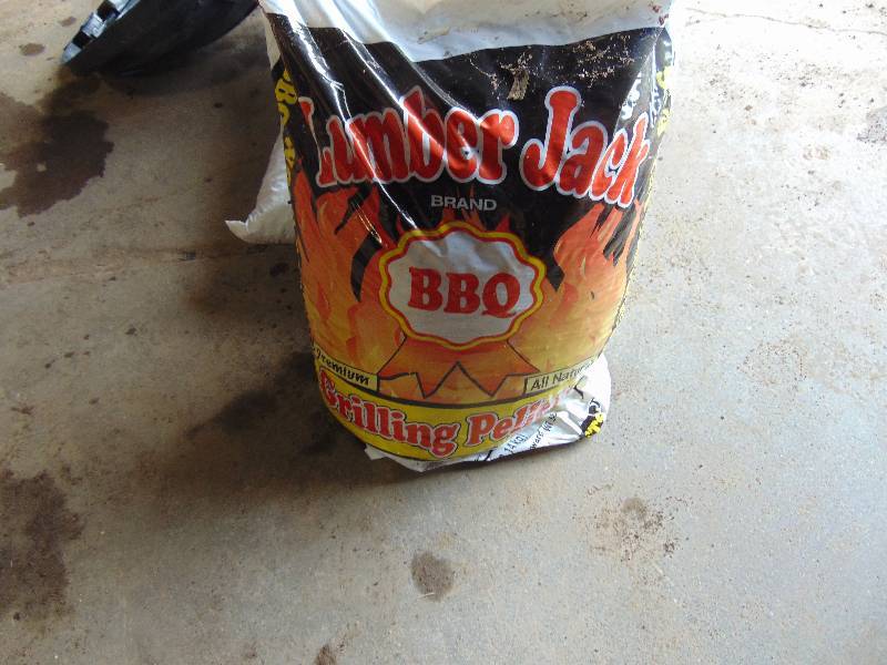 lot 157 image: Wood Grill Pellets and Storage Can