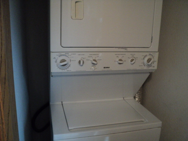 lot 8 image: Kenmore stacking washer and dryer, ...