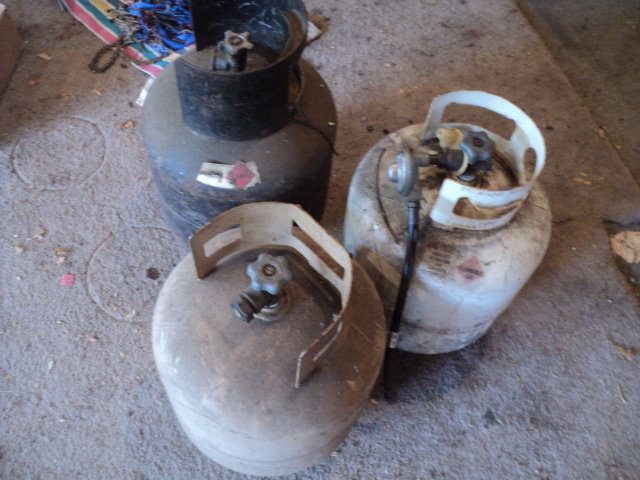 lot 19 image: 3 propane cylinders one seems to ha...