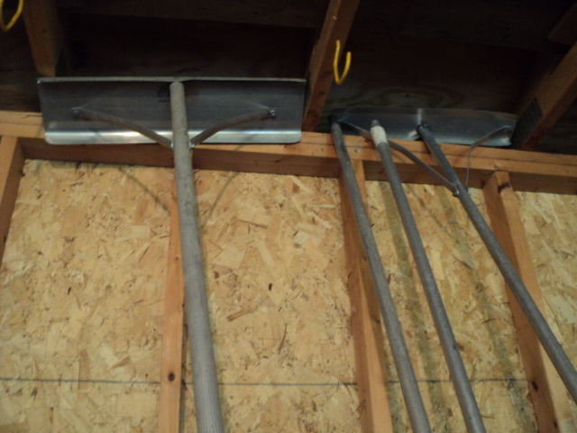 lot 20 image: 3 roof shovels with extensions...