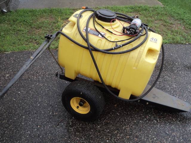 lot 51 image: 40 Gallon John Deere sprayer on whe...