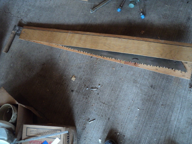 lot 71 image: Large hand saw...