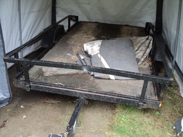 lot 1 image: 5.5 x 10 foot flatbed trailer. 2 in...