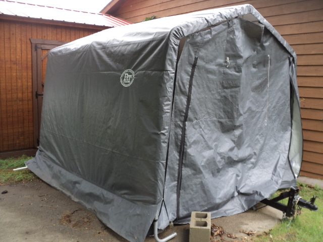 lot 2 image: Shelter Logic frame storage garage,...