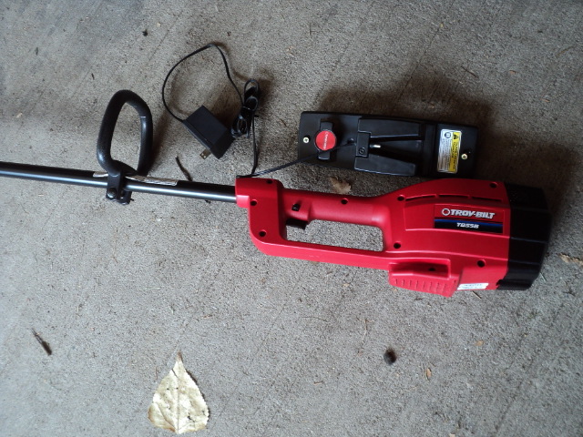 lot 101 image: Troy Bilt lawn trimmer with hanger ...