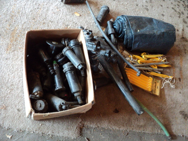 lot 113 image: Lawn sprinklers, tent stakes, etc...