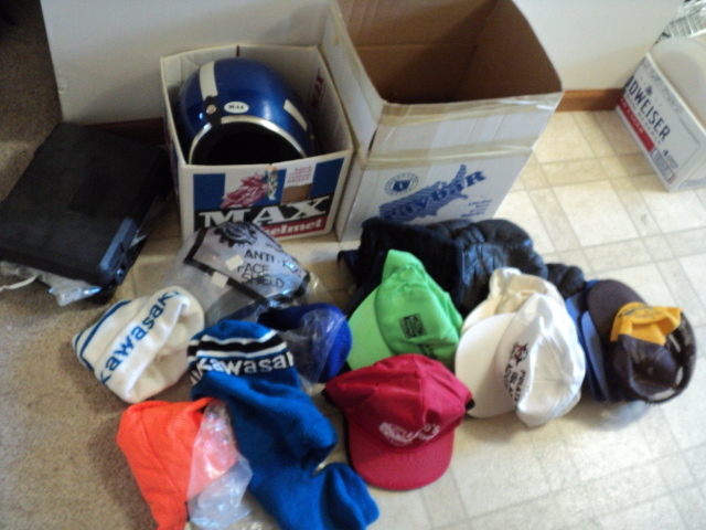 lot 202 image: Helmet, caps and outdoor gear...
