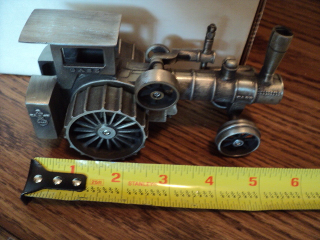 lot 205 image: Pewter Case tractor...