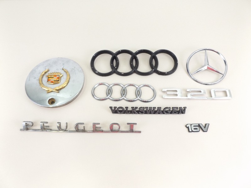 lot 9 image: Lot of Vintage Car Emblems