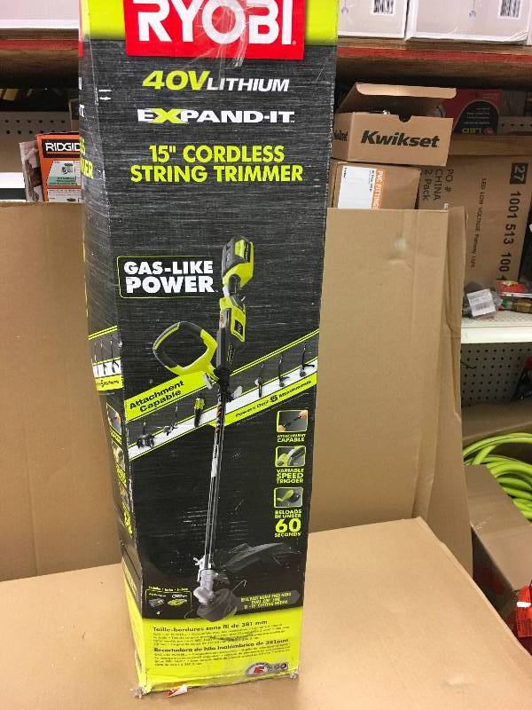 lot 11 image: RYOBI 40-Volt Lithium-Ion Cordless Attachment Capable String Trimmer - 2.6 Ah Battery and Charger Included in working conditions