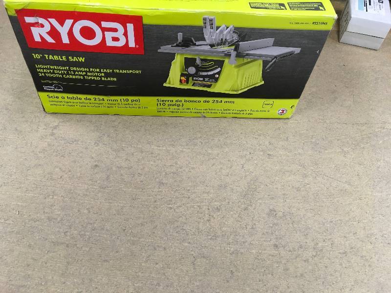 lot 23 image: RYOBI 10 in. 15 Amp Table Saw in good working conditions