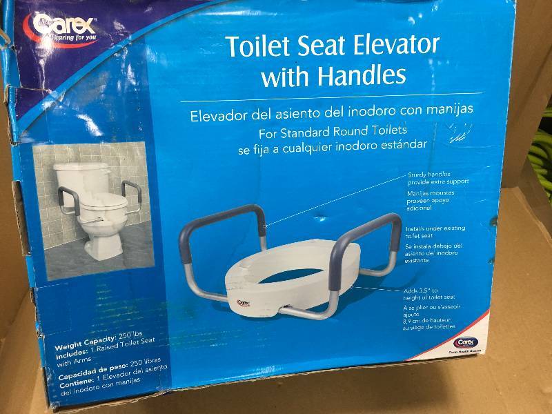 lot 89 image: CAREX Elevated Toilet Seat with Handles in White for Standard Toilets in good conditions