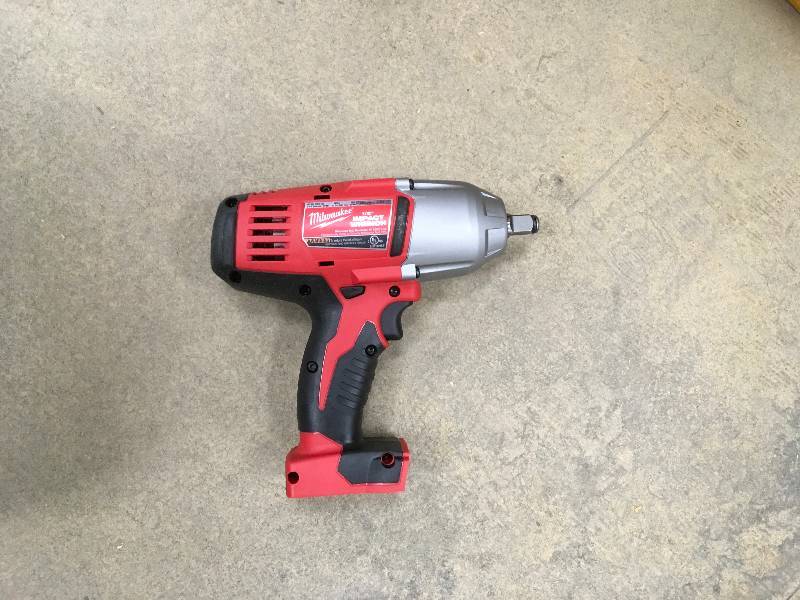 lot 99 image: MILWAUKEE M18 18-Volt Lithium-Ion Cordless 12 in. Impact Wrench W Friction Ring (Tool-Only) in like New conditions