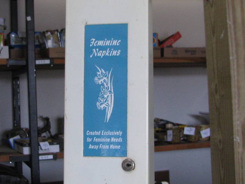 lot 82 image: Feminine Napkin Dispenser