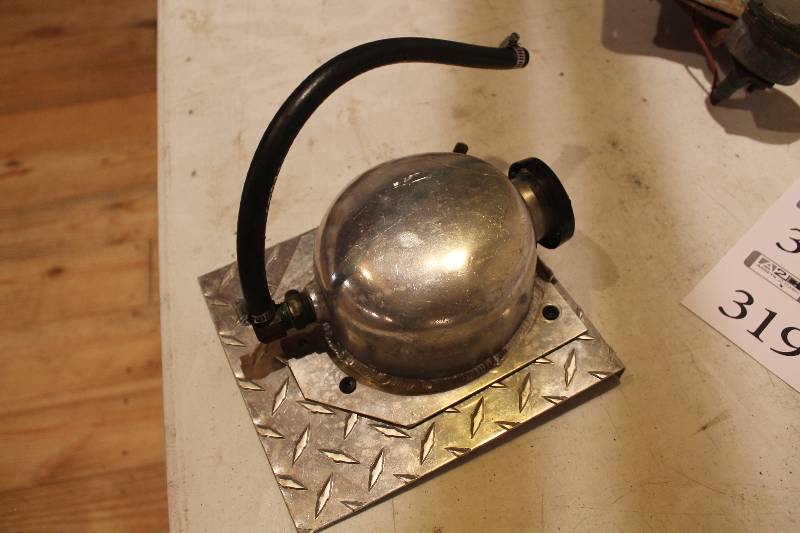 lot 319 image: Overflow tank and bracket automotive.