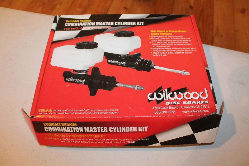 lot 327 image: Master cylinder reservoirs and hoses.
