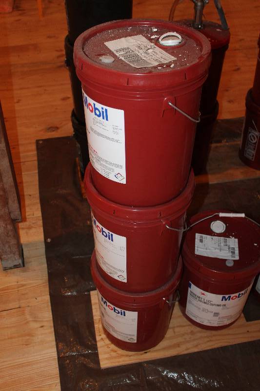 lot 372 image: Lot of (3), 5-gallon pails of Mobil water soluble cutting oil. Two are new  unopened, one has been opened.